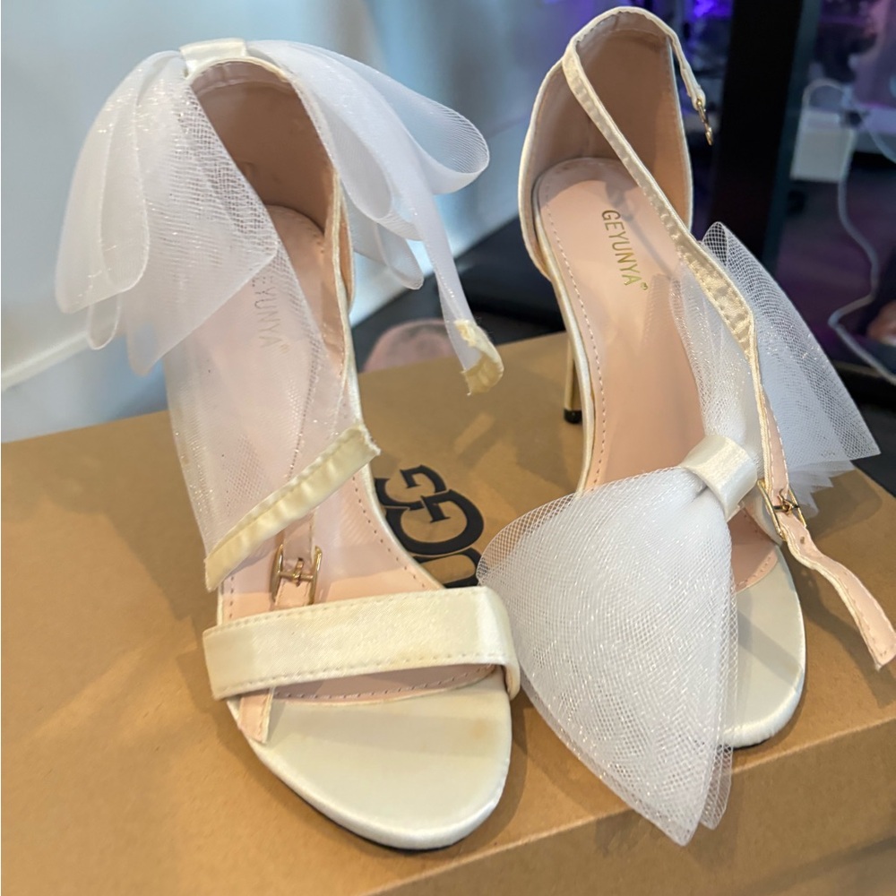 Large bow heels